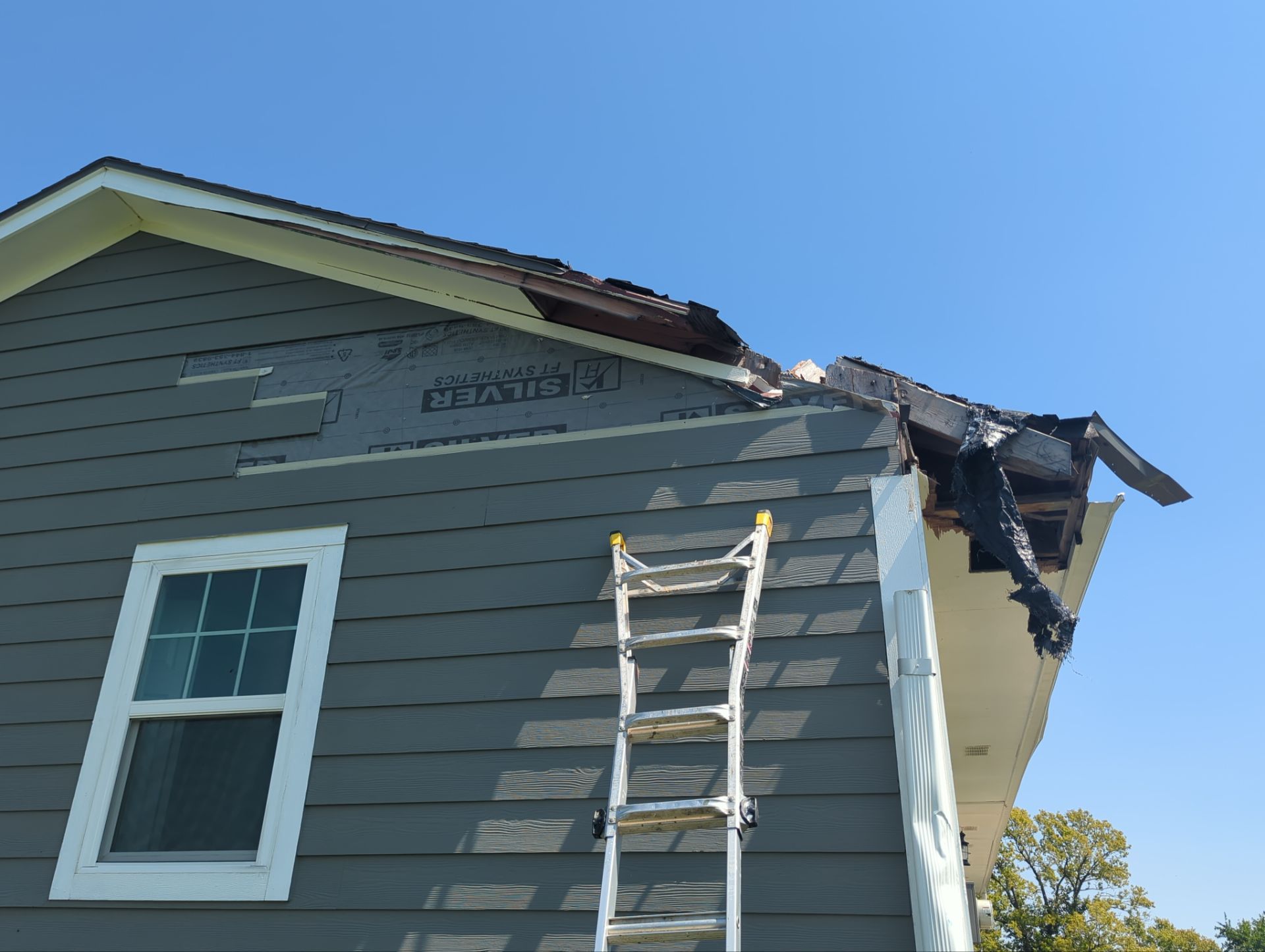 Storm Siding & Roof Repair for the Quinton Family - Photo 8